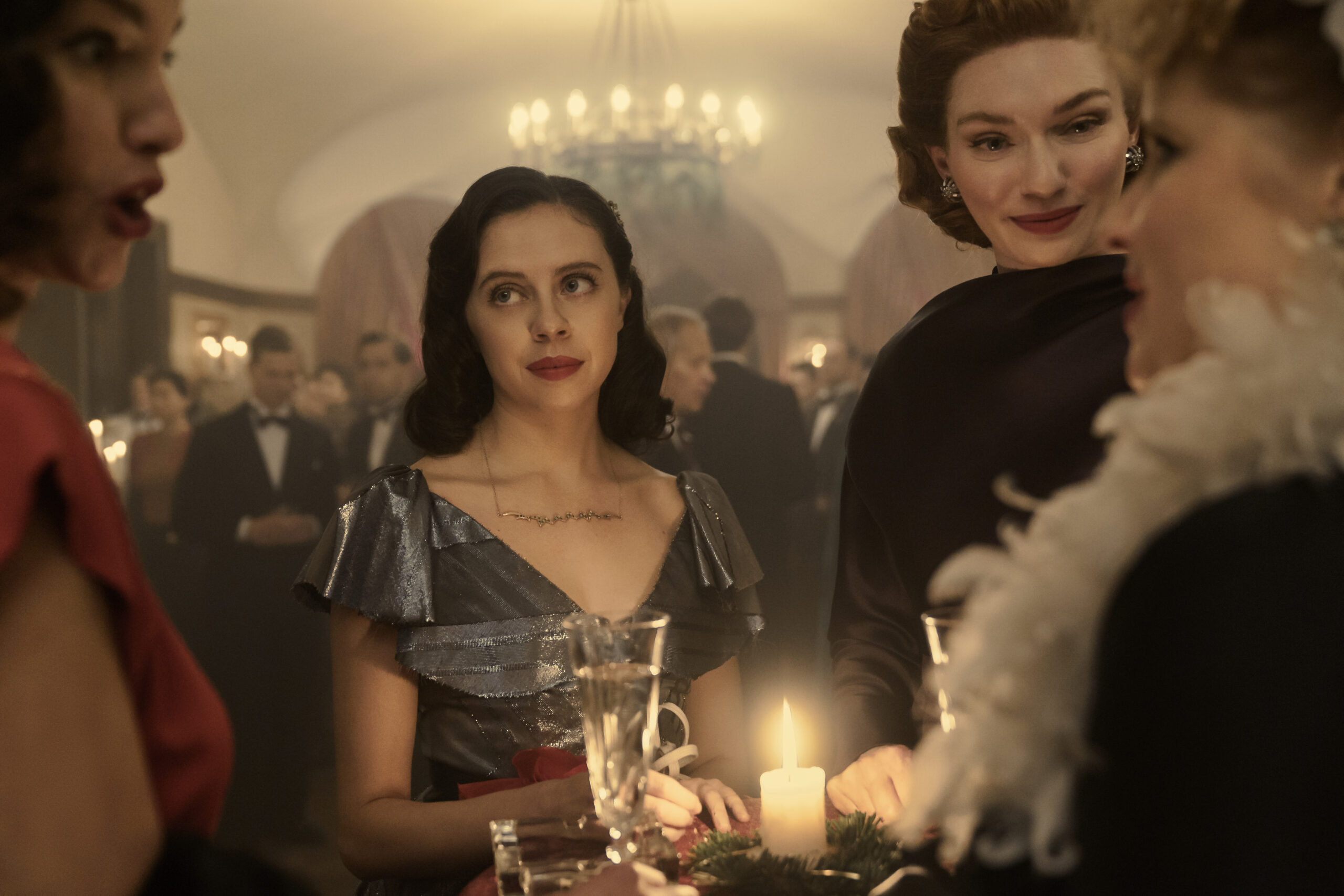Miep, played by Bel Powley, and Tess, played by Eleanor Tomlinson, attend a party in A SMALL LIGHT.